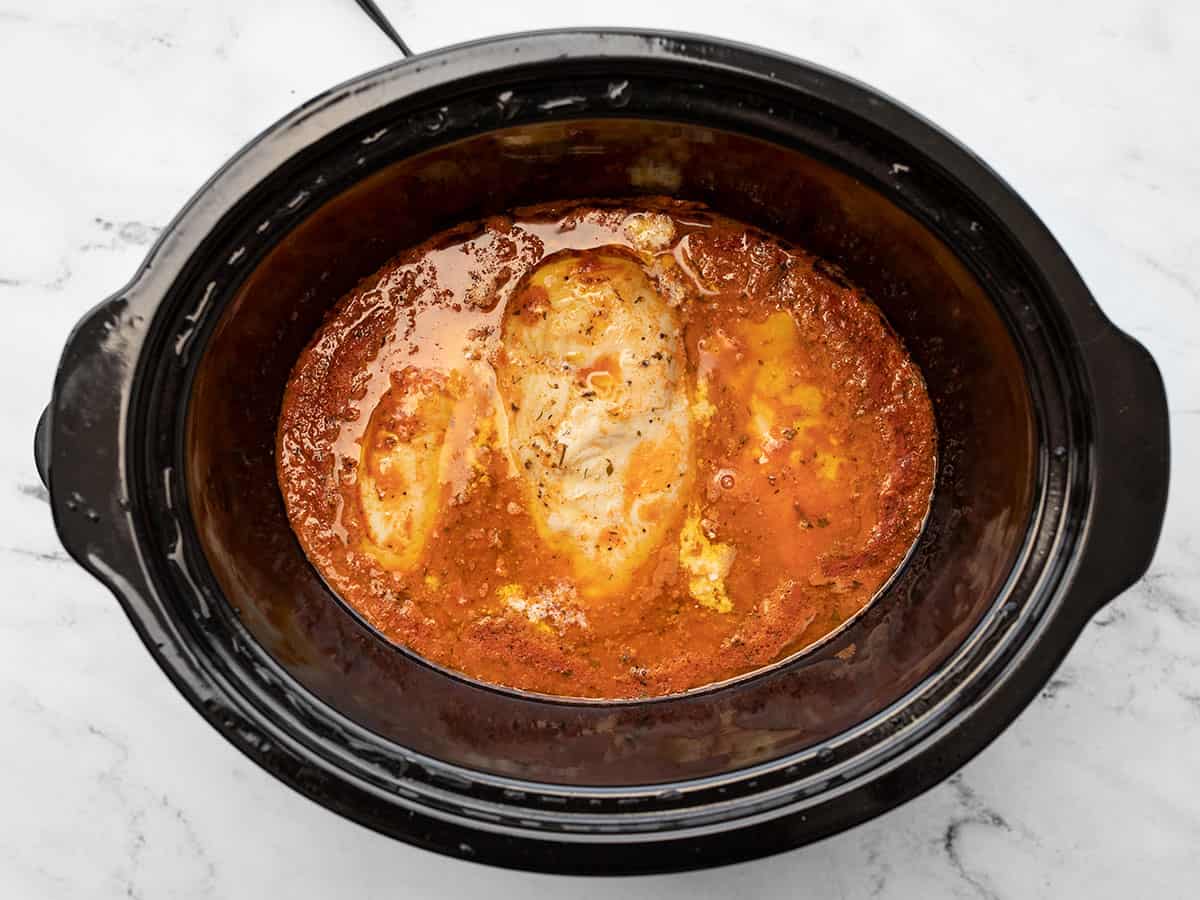 Cooked buffalo chicken in the slow cooker