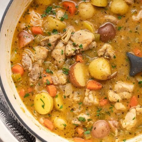 Close up of a pot full of chicken stew
