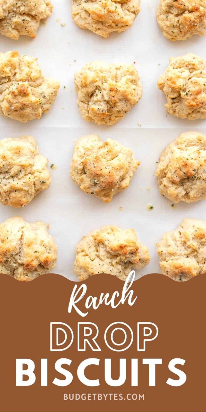 overhead view of ranch drop biscuits on the baking sheet, title text at the bottom