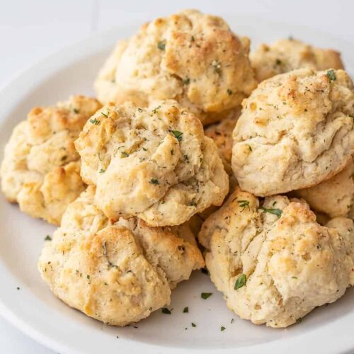 side view of ranch drop biscuits on a plate