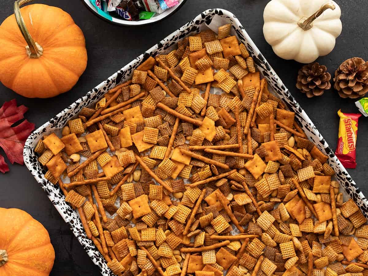 spicy chex mix on a baking sheet