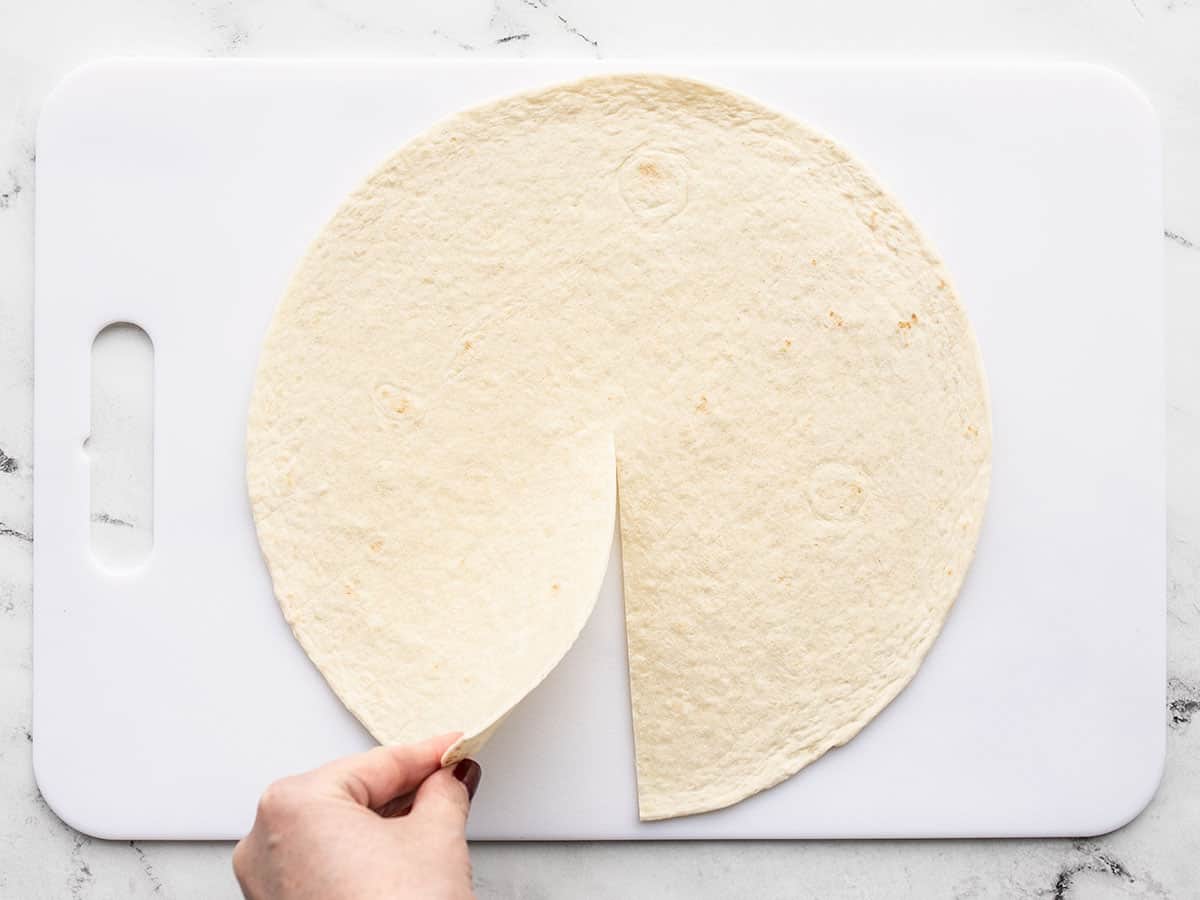 Sliced tortilla on a cutting board
