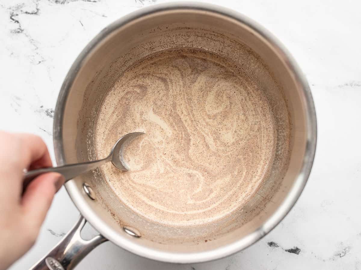 heated gingerbread creamer in the saucepot