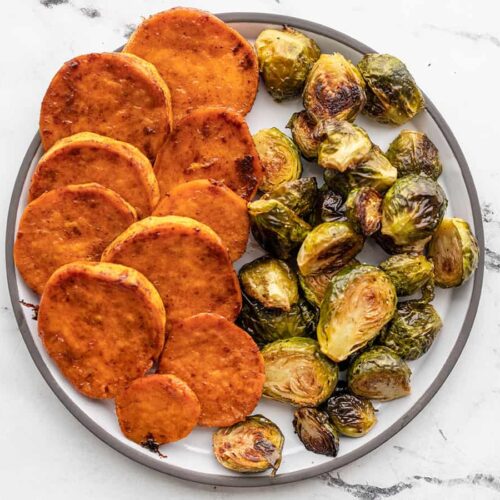 Candied Sweet Potatoes and Roasted Brussels Sprouts on a plate