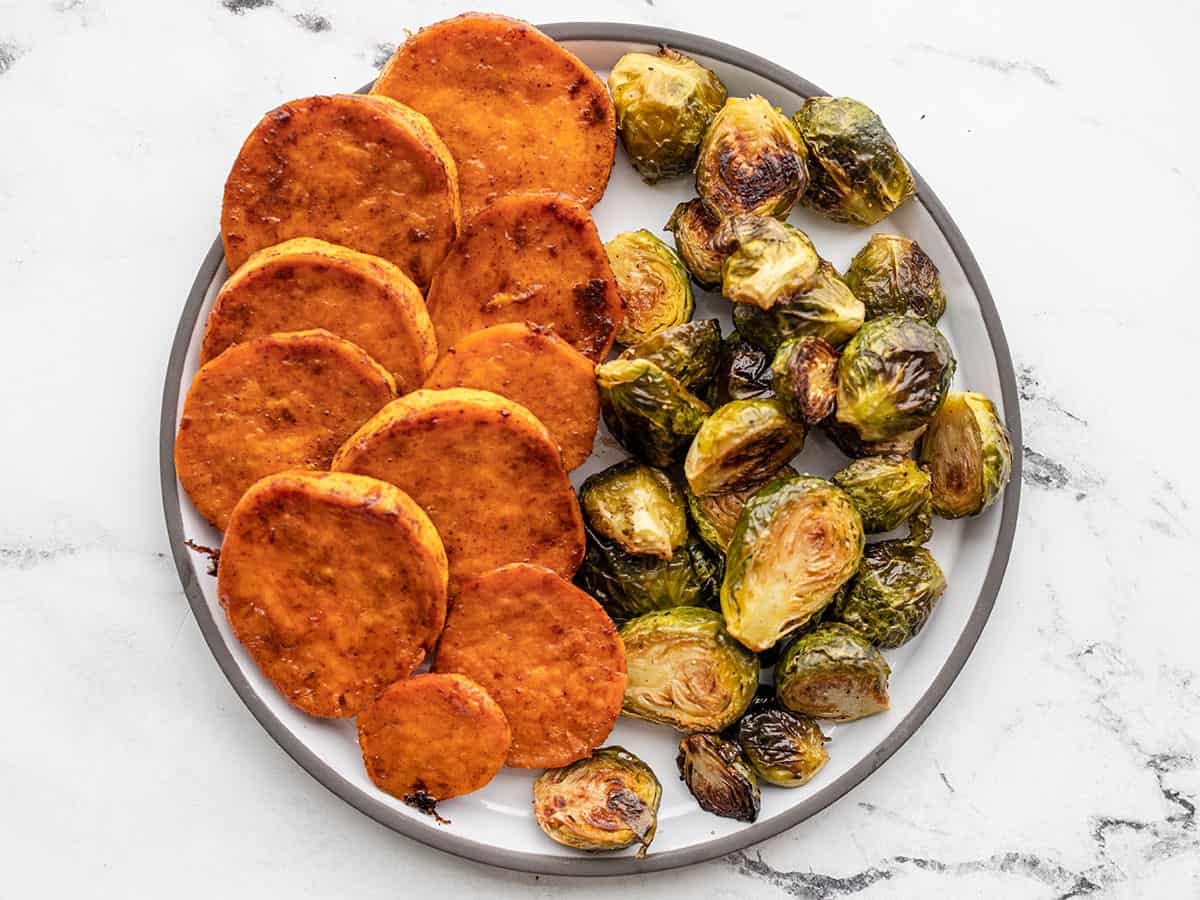 Candied Sweet Potatoes and Roasted Brussels Sprouts on a plate