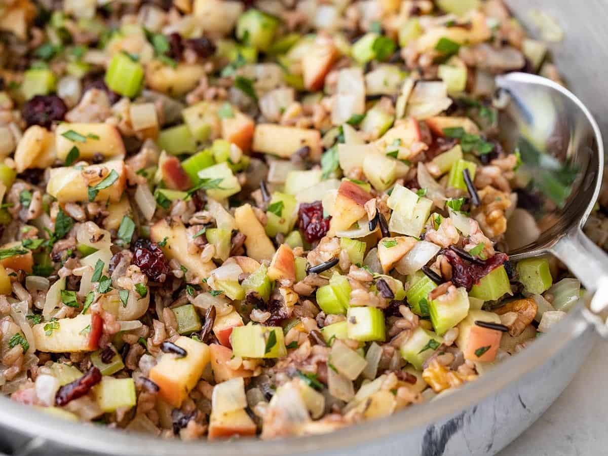 Close up side view of wild rice pilaf in the skillet