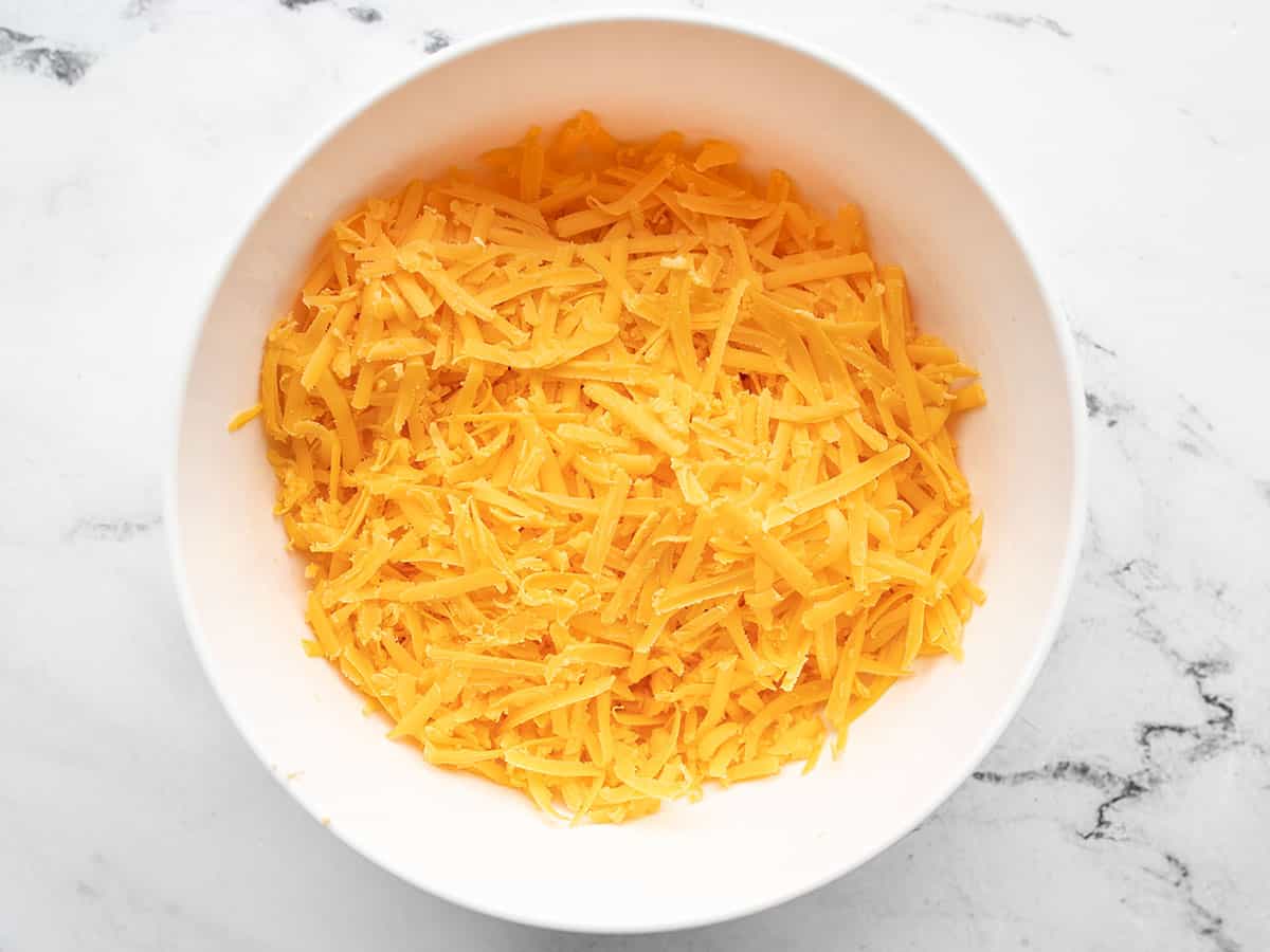 Shredded cheddar in a bowl