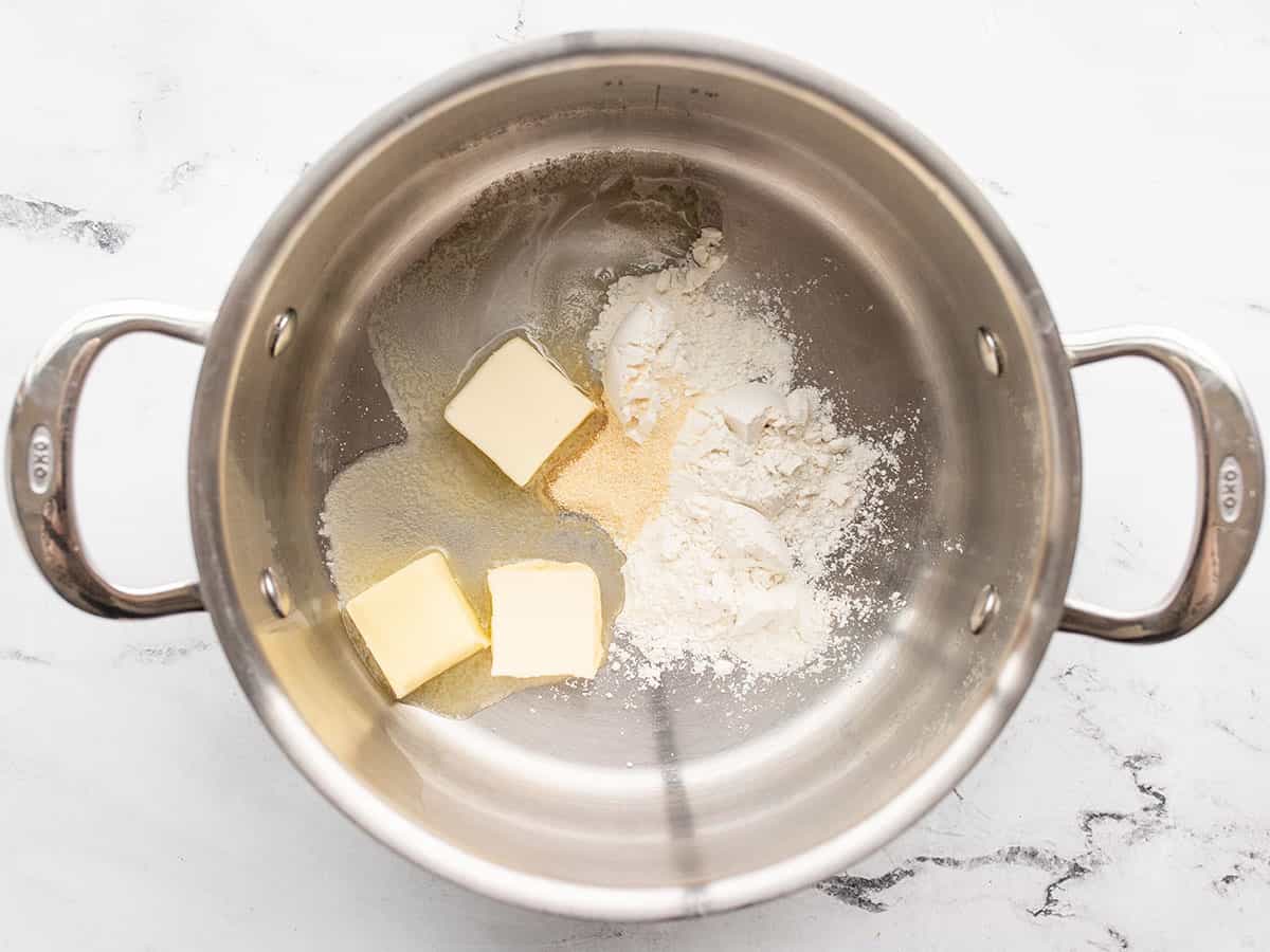 Butter flour and onion powder in the pot