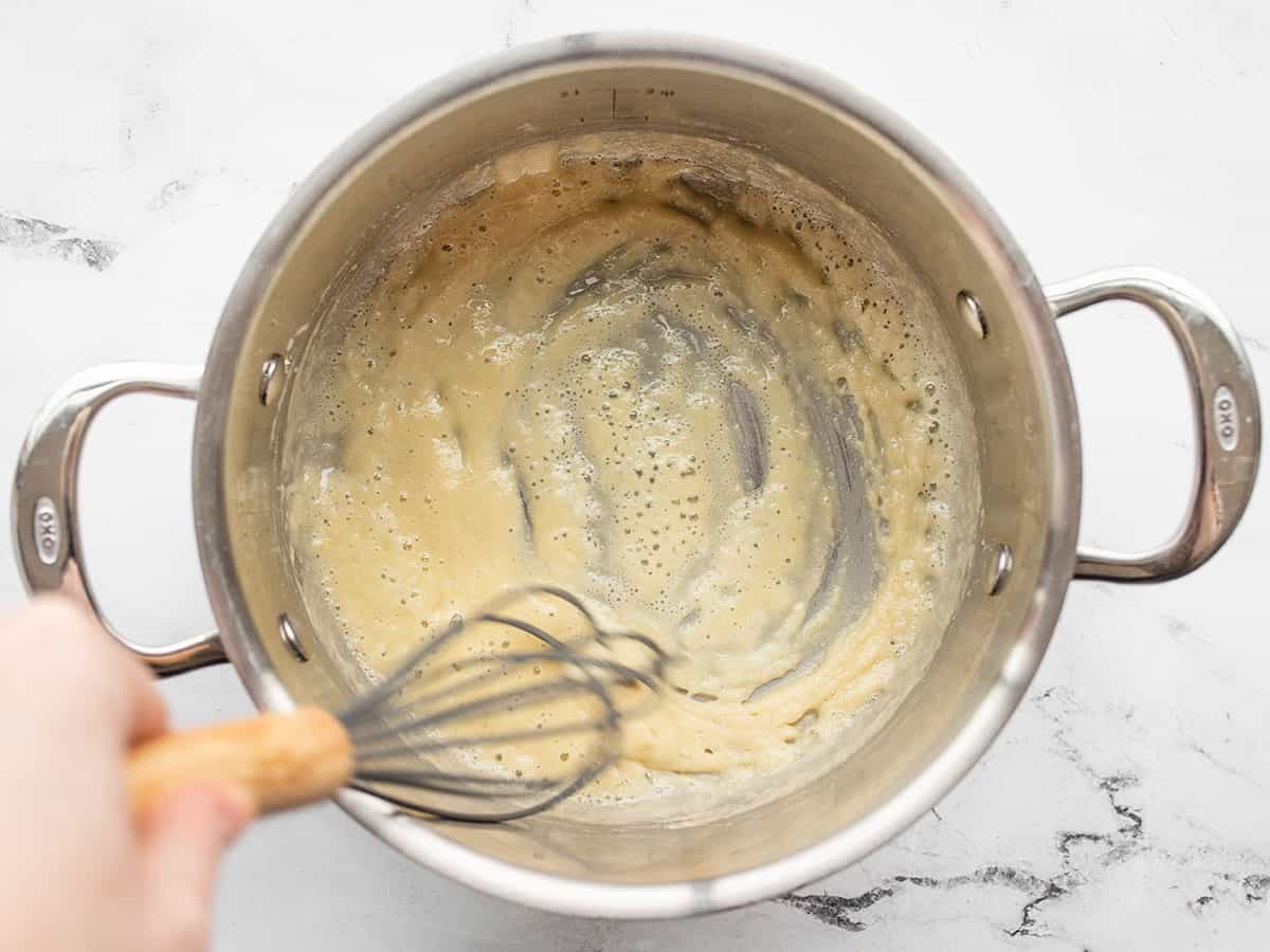 Roux being whisked in the pot