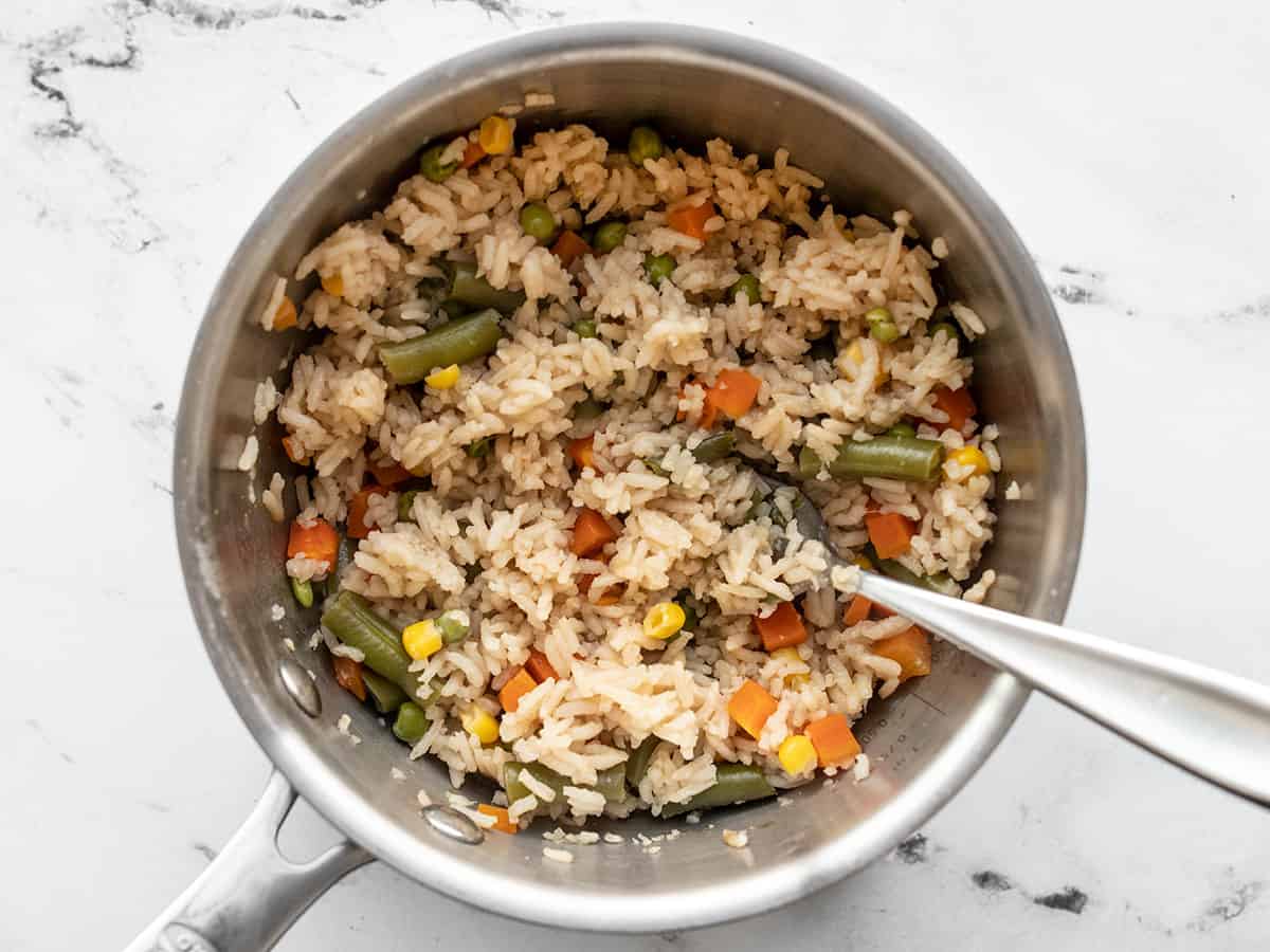 fluffed rice and vegetables in the pot