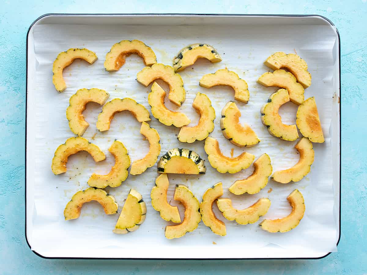 Seasoned squash ready to roast