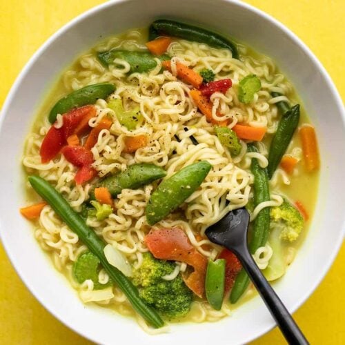 Close up overhead view of a bowl of coconut curry ramen