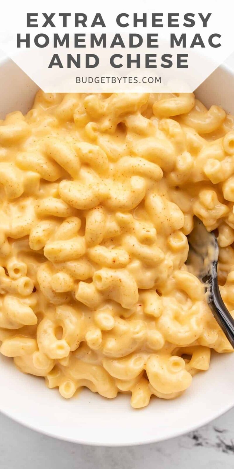 close up of a bowl of mac and cheese, title text at the top