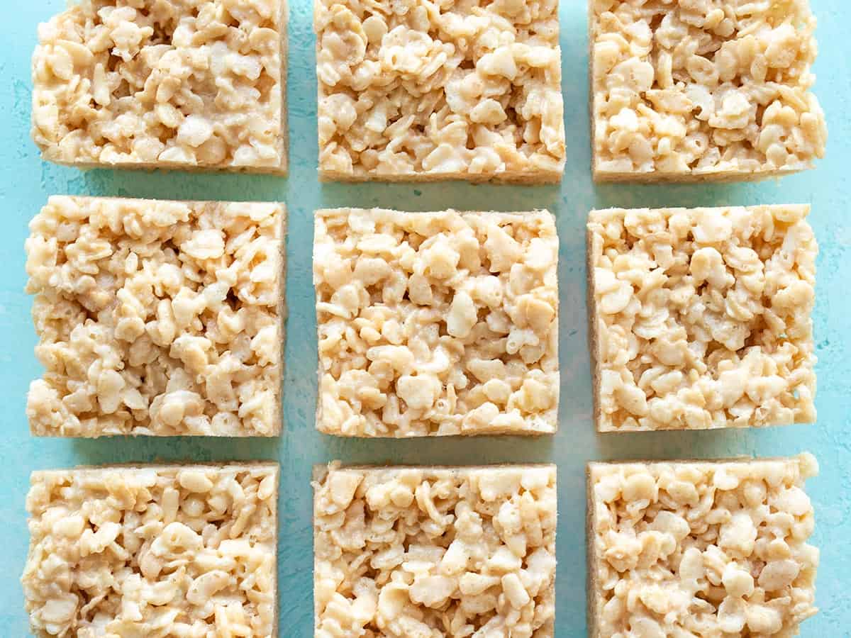 Rice krispie treats cut and lined up in a grid