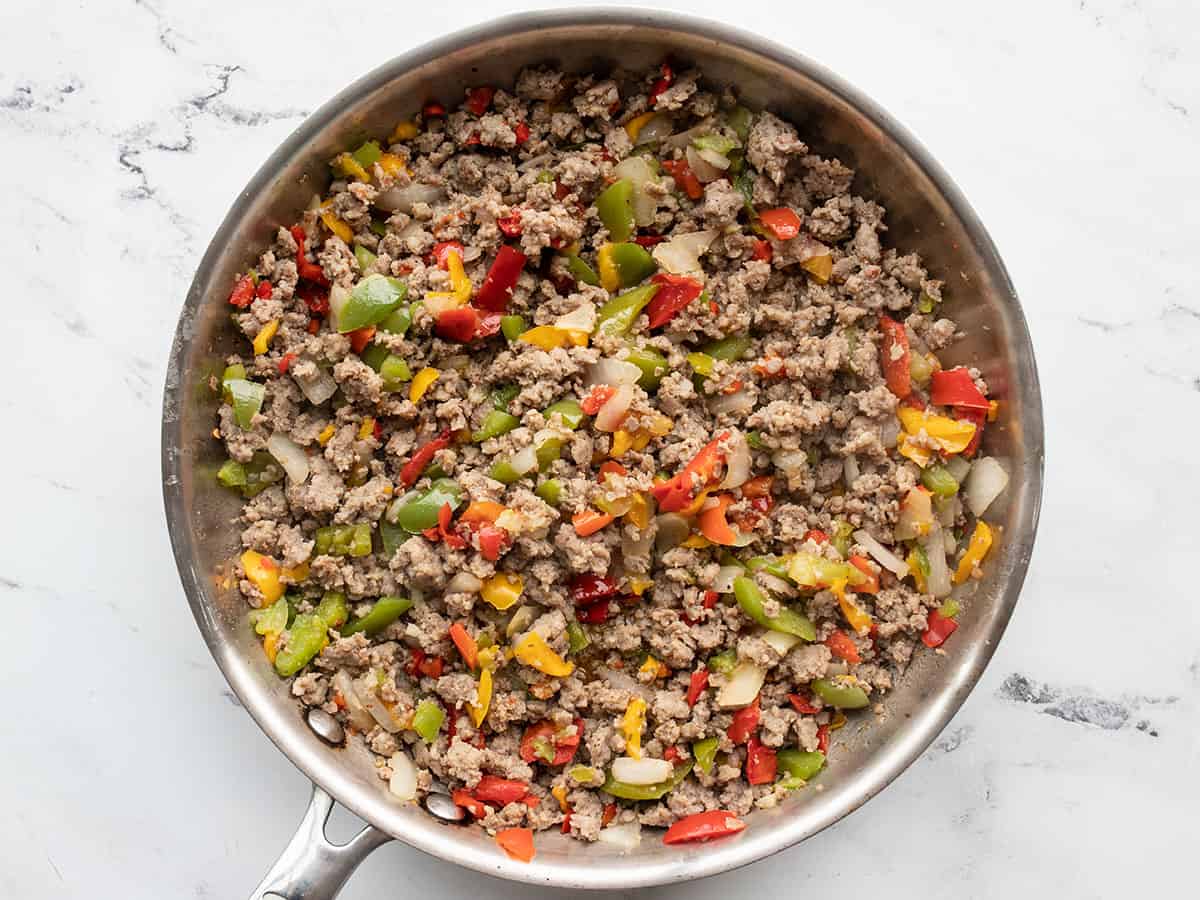 sausage and peppers in a skillet