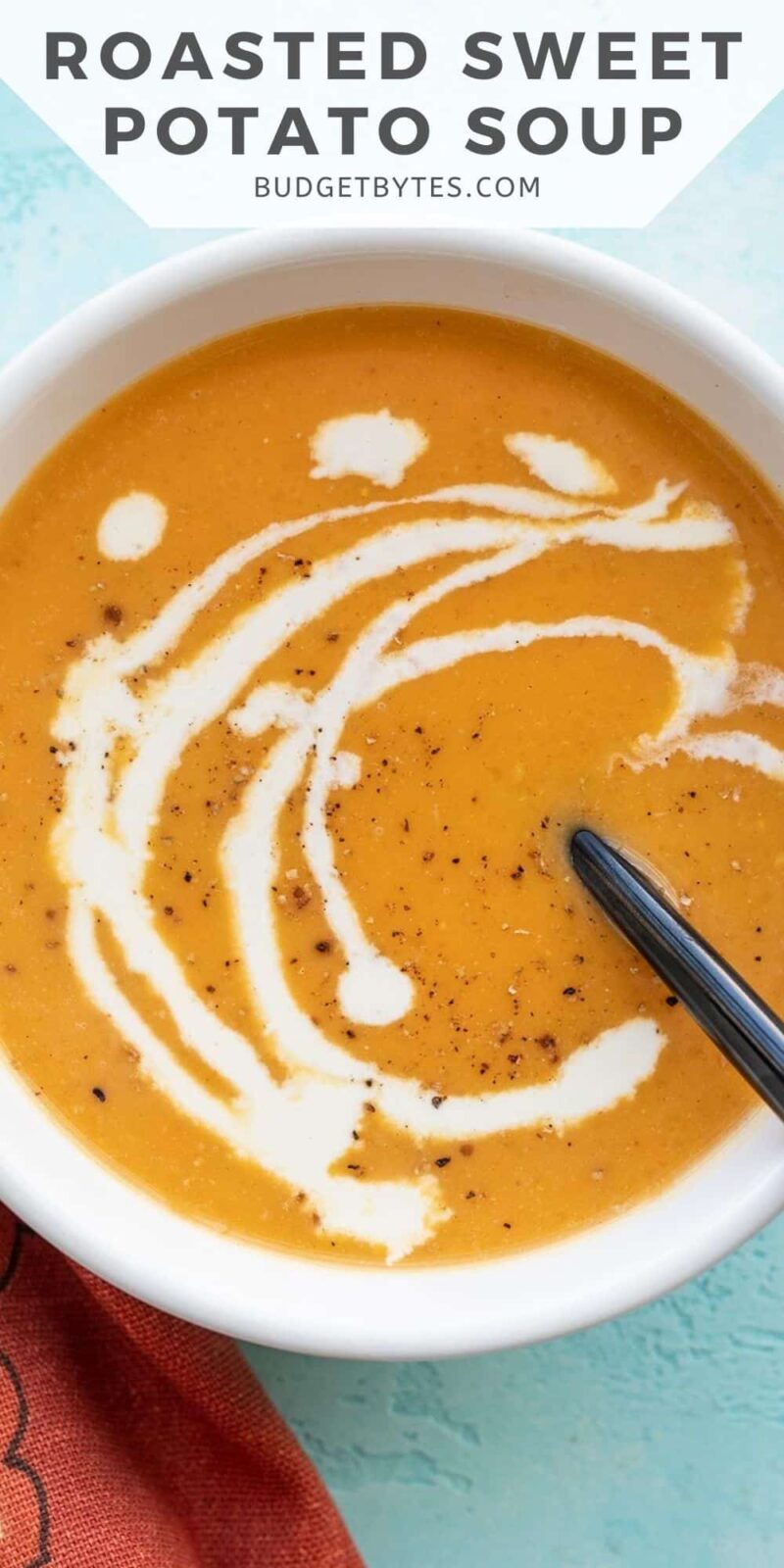 Overhead view of a bowl of creamy sweet potato soup with title text at the top