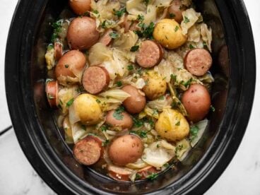 https://www.budgetbytes.com/wp-content/uploads/2022/01/Slow-Cooker-Cabbage-and-Kielbasa-close-368x276.jpg