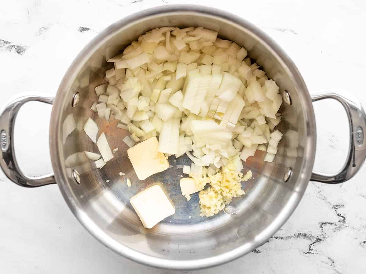 Onion, garlic, and butter in a soup pot