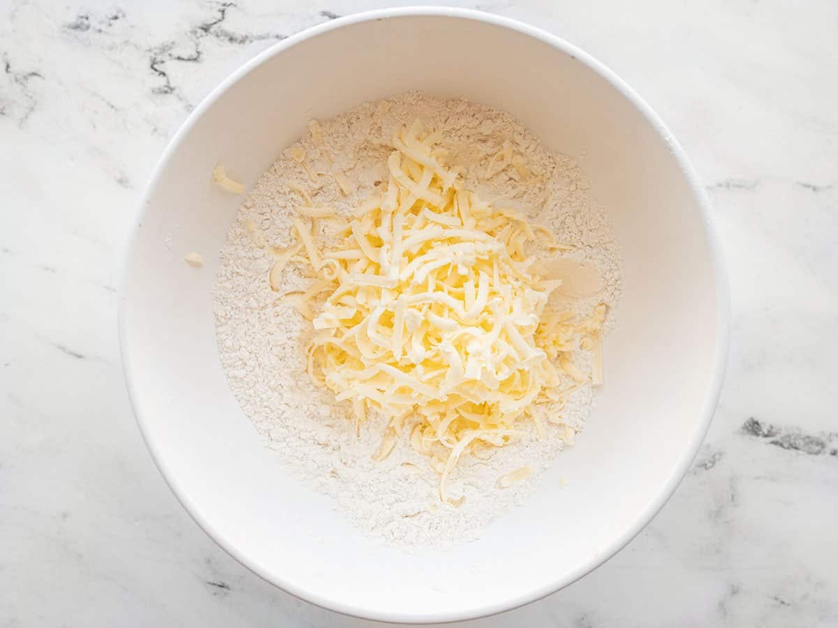 Grated butter added to flour mixture