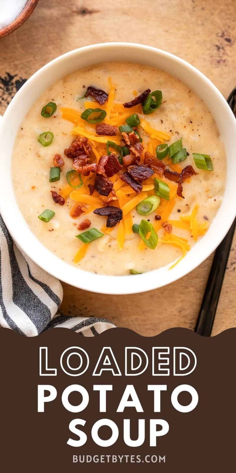 a bowl of potato soup with toppings, title text at the bottom.