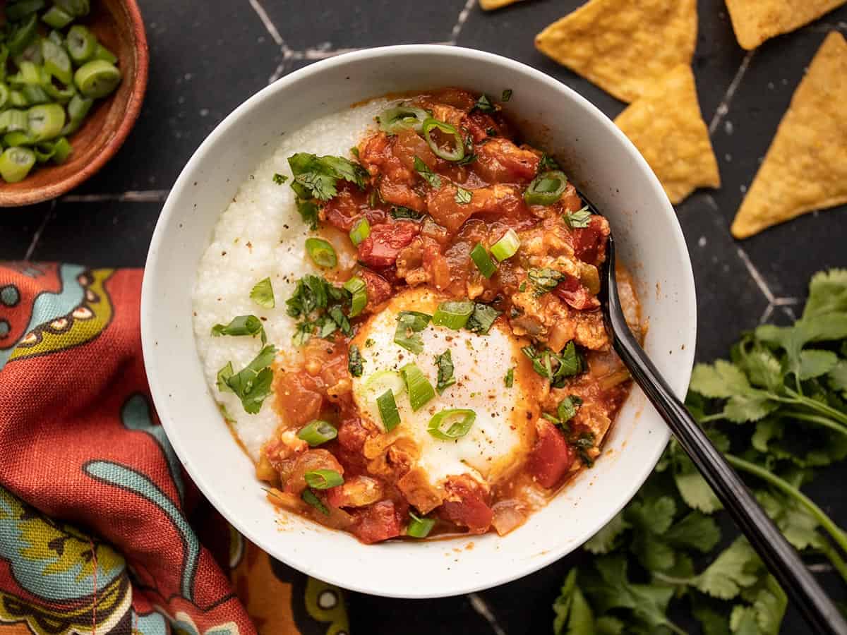 salsa poached egg in a bowl with grits