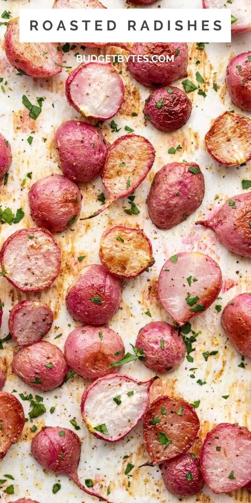 close up overhead view of roasted radishes on a baking sheet, title text at the top.