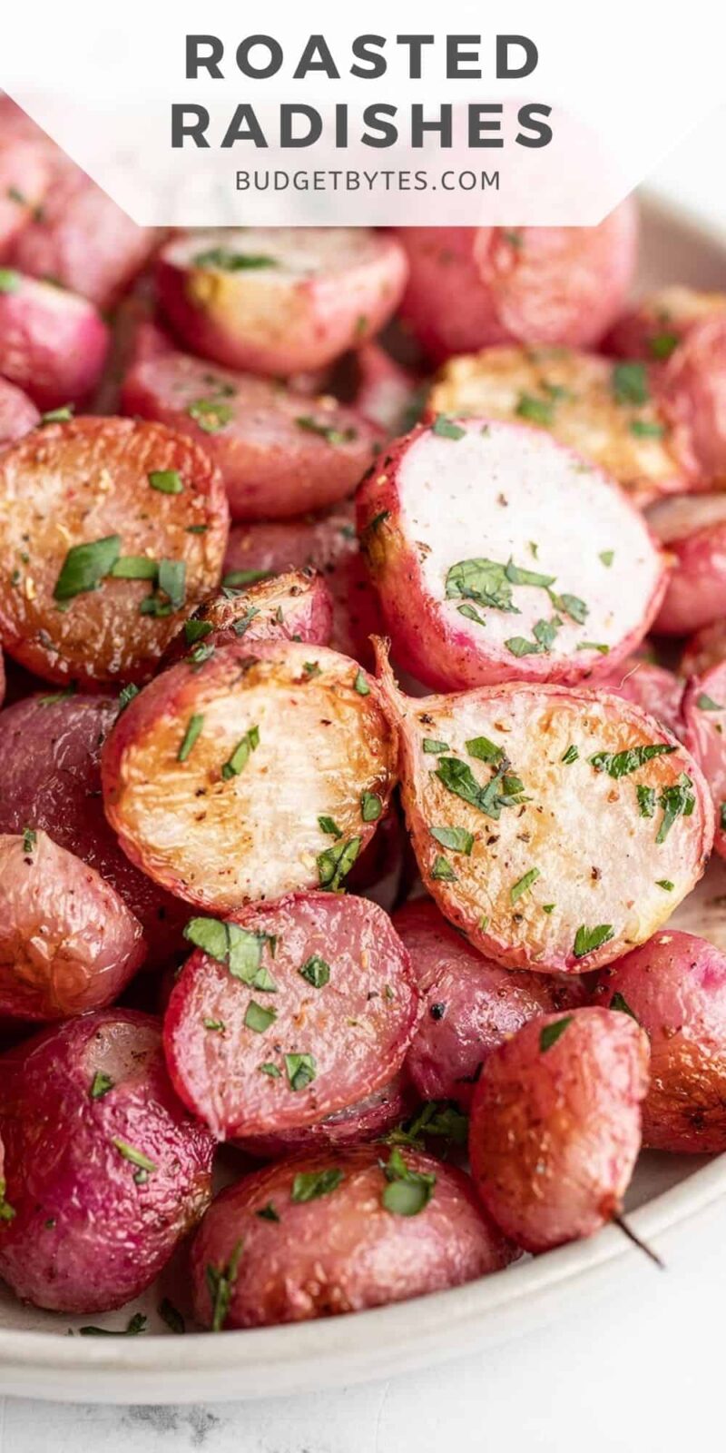 Close up side view of roasted radishes in a bowl, title text at the top.