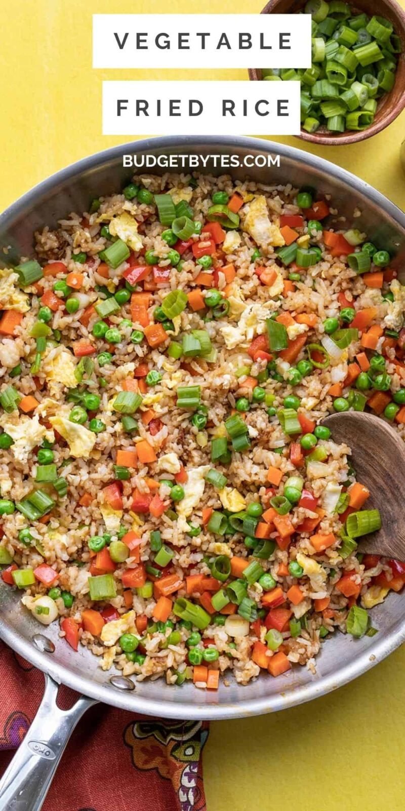 Overhead view of a skillet full of vegetable fried rice.