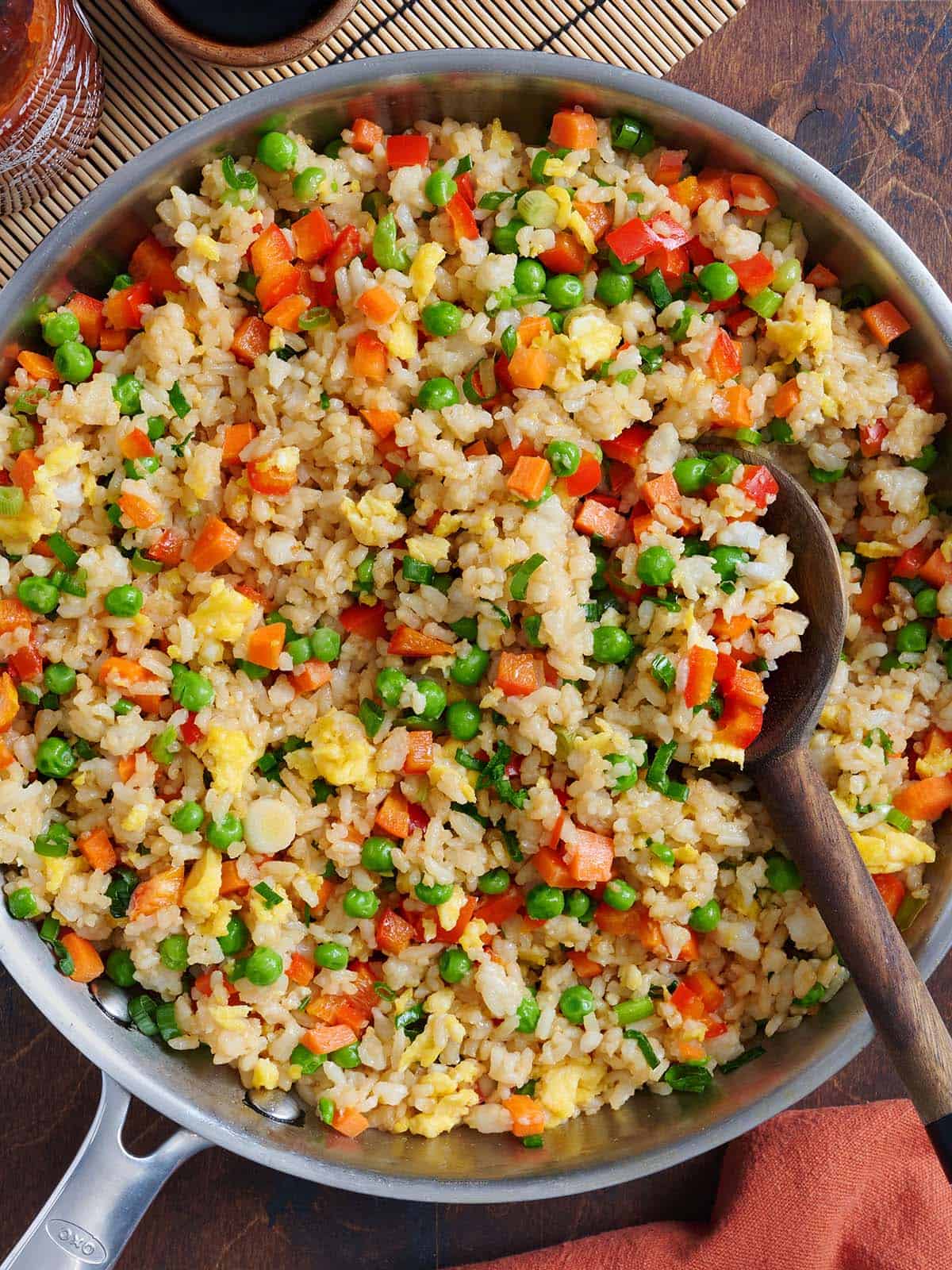 Overhead view of vegetable fried rice in a skillet.