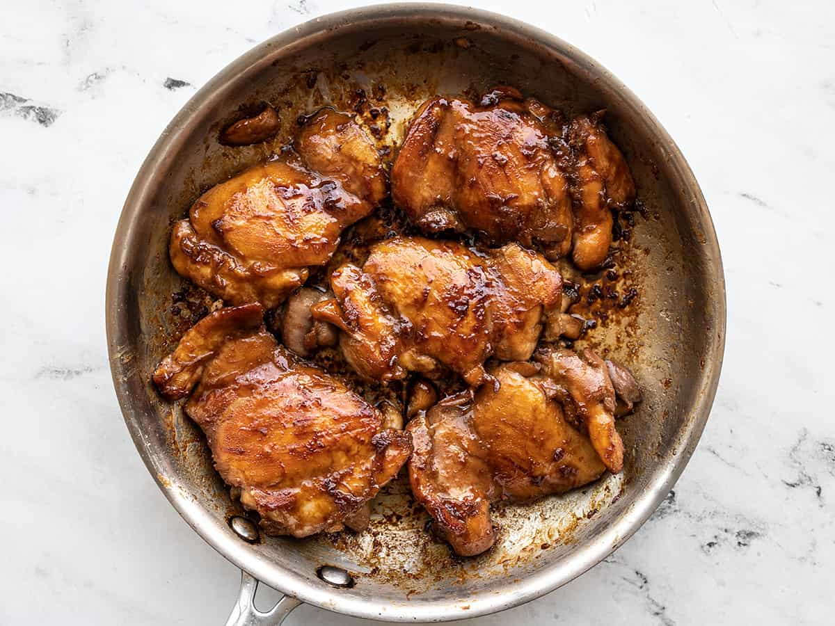 Cooked teriyaki chicken in the skillet.