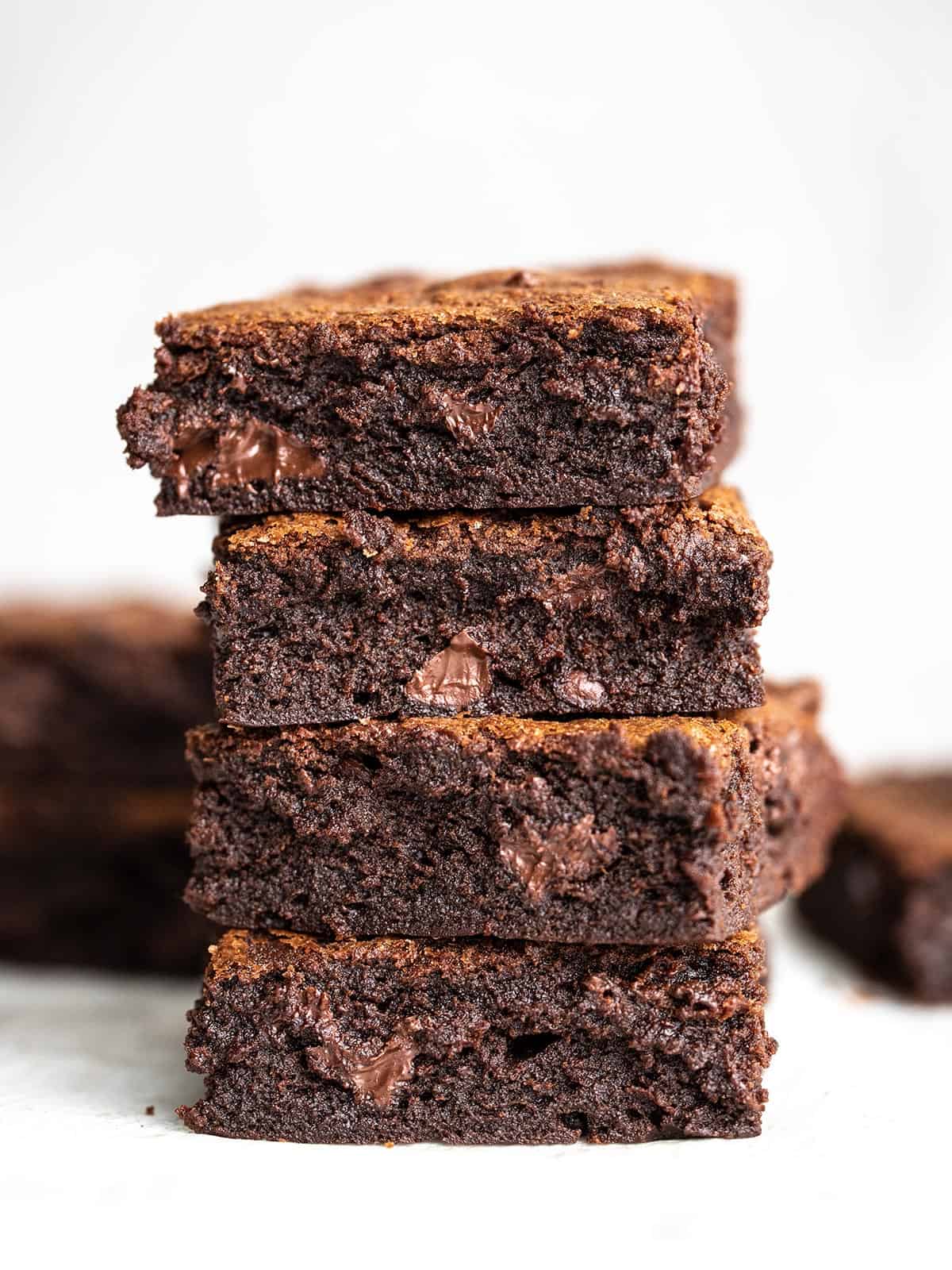A stack of fudgy homemade brownies.