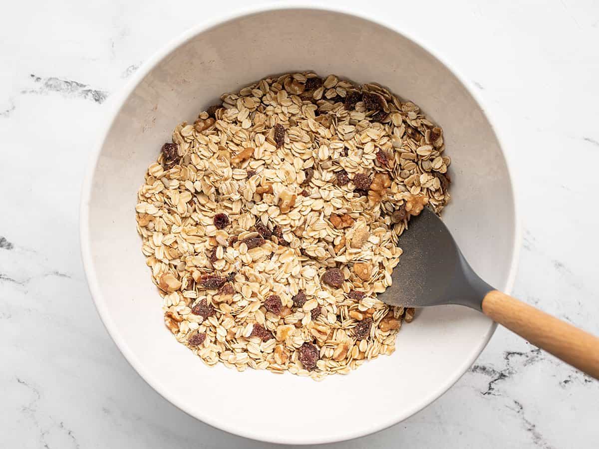 Muesli ingredients stirred together in the bowl.