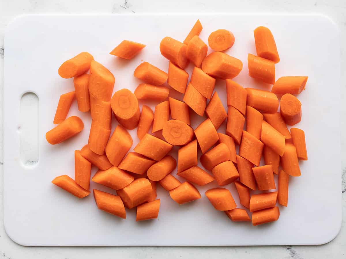 Sliced ​​carrot on a sliced ​​board.