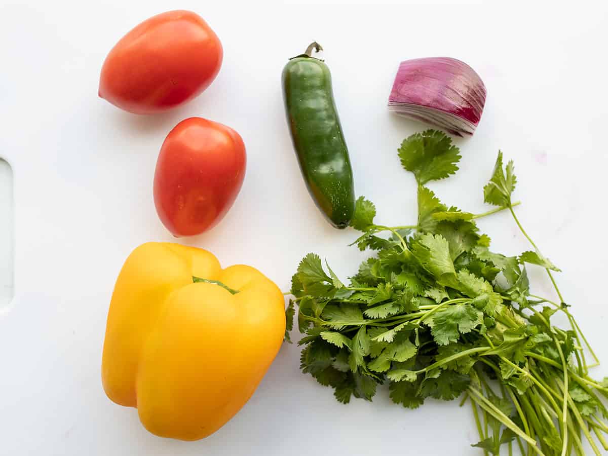 Fresh vegetables on a cutting board.