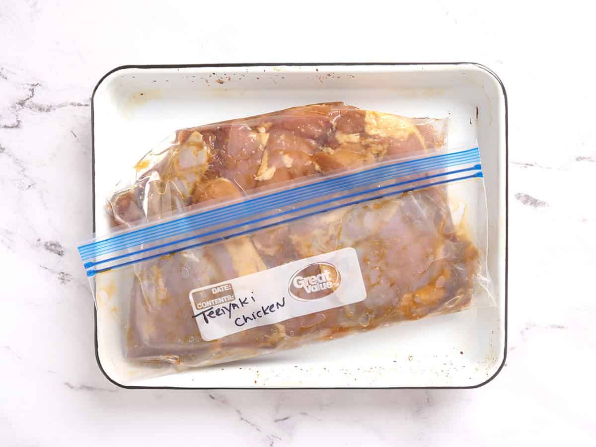 Teriyaki chicken marinading in a bag.