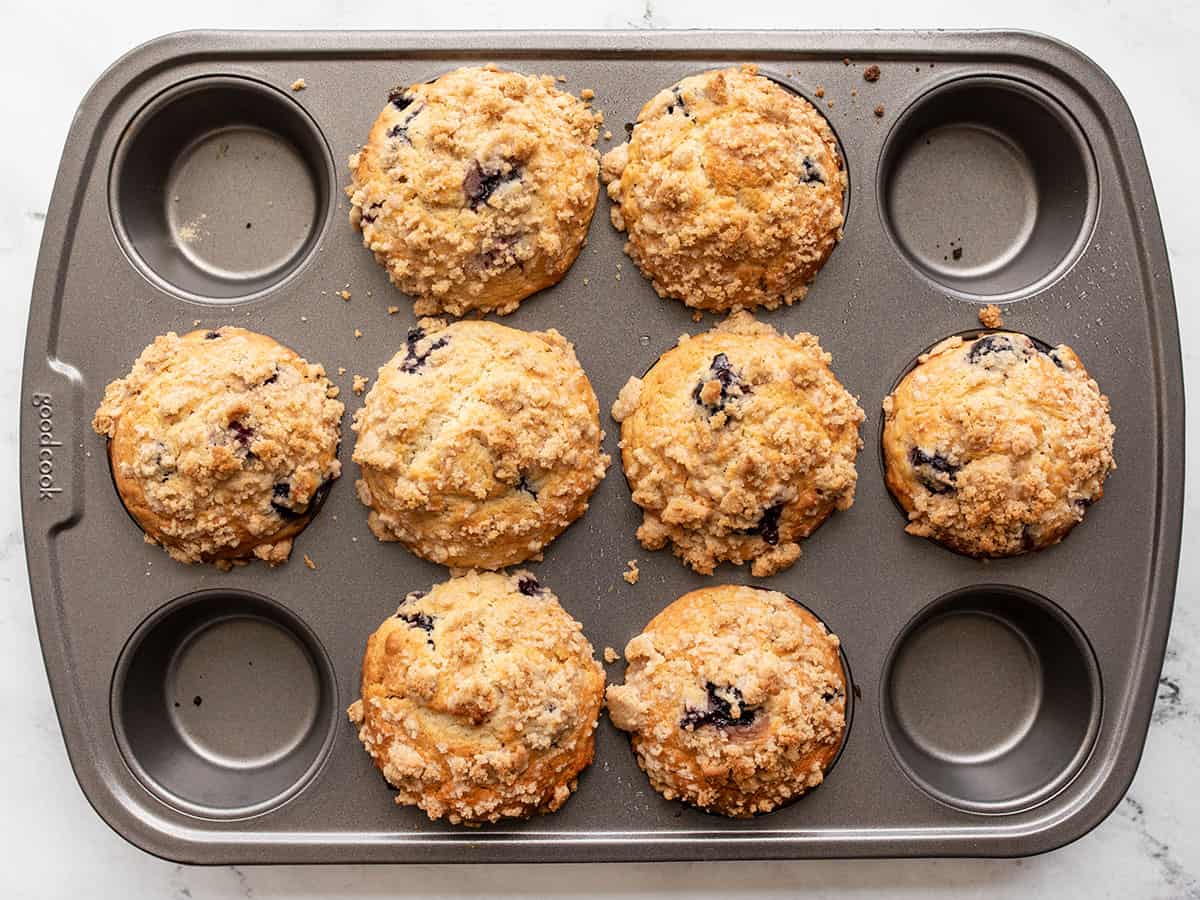 Baked blueberry muffins in the muffin tin.