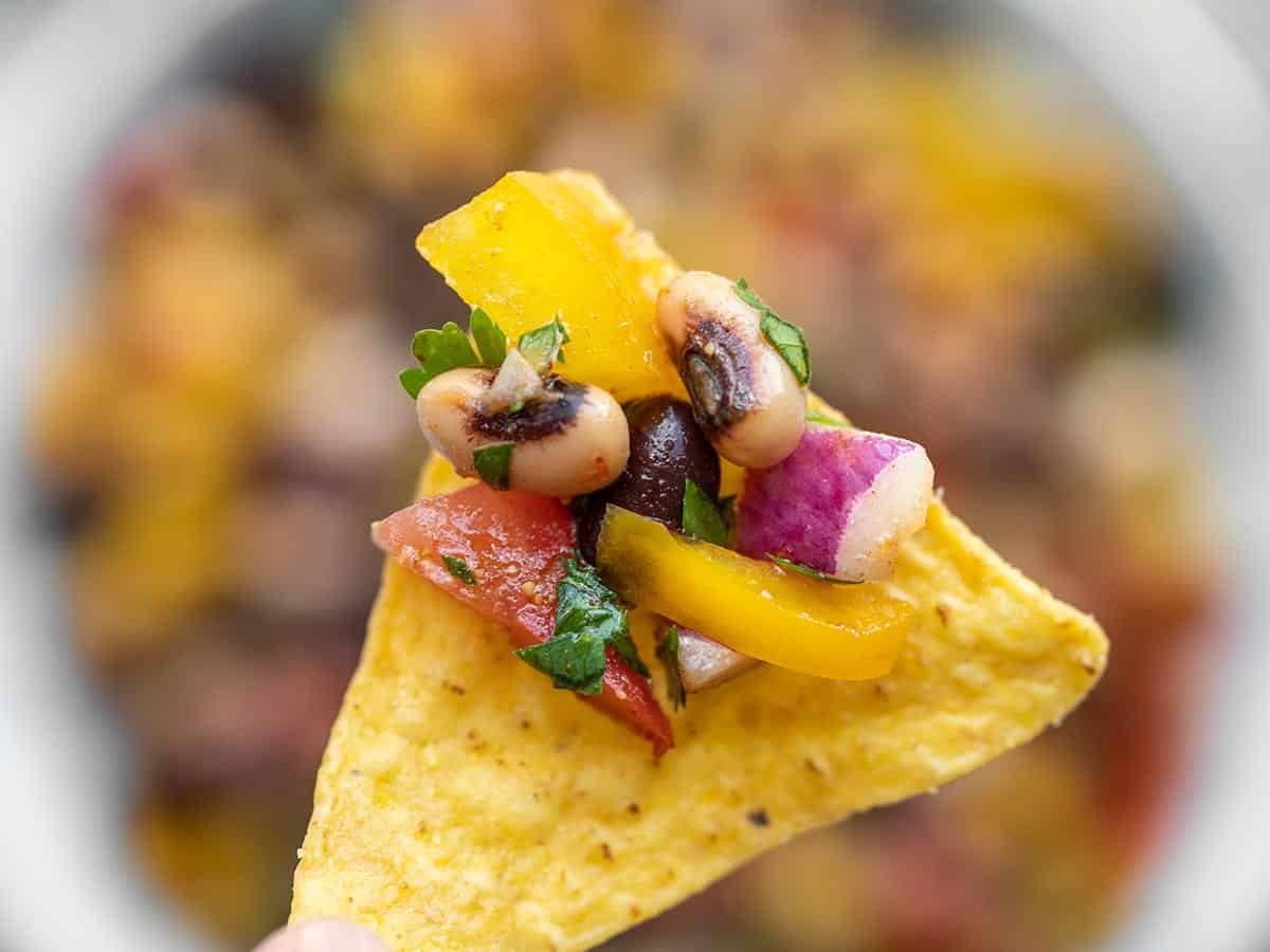 Close up of Cowboy Caviar on a chip.