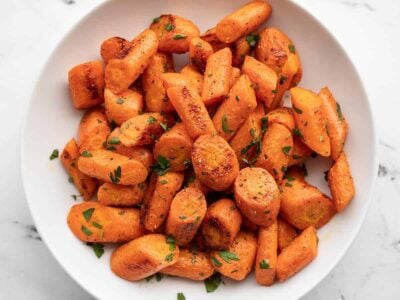 Roasted carrots in a bowl from above.
