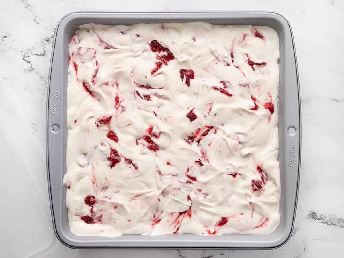 Strawberry ice cream that's been frozen for eight hours and is ready to serve.