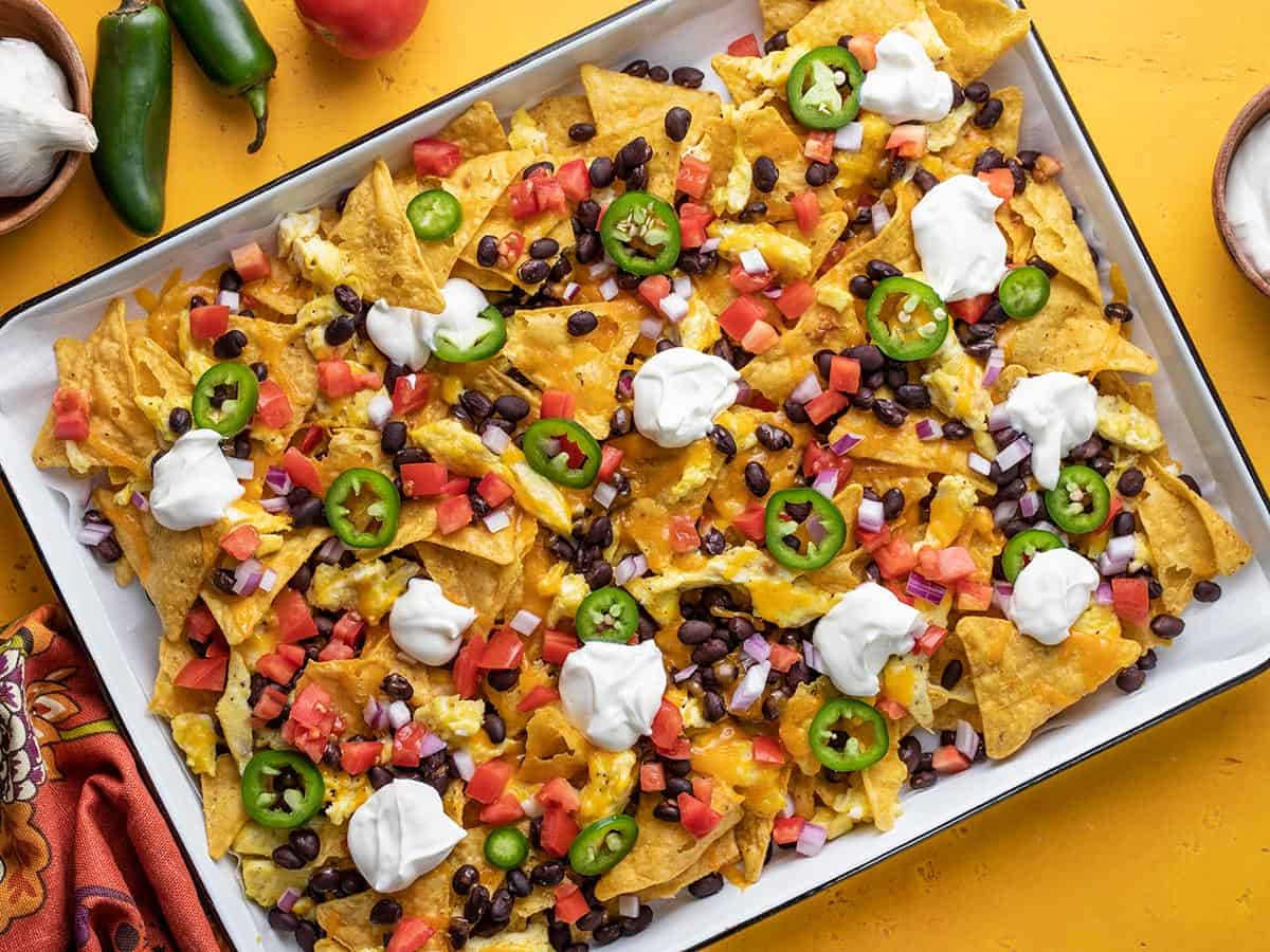 Overhead view of breakfast nachos on the sheet pan.