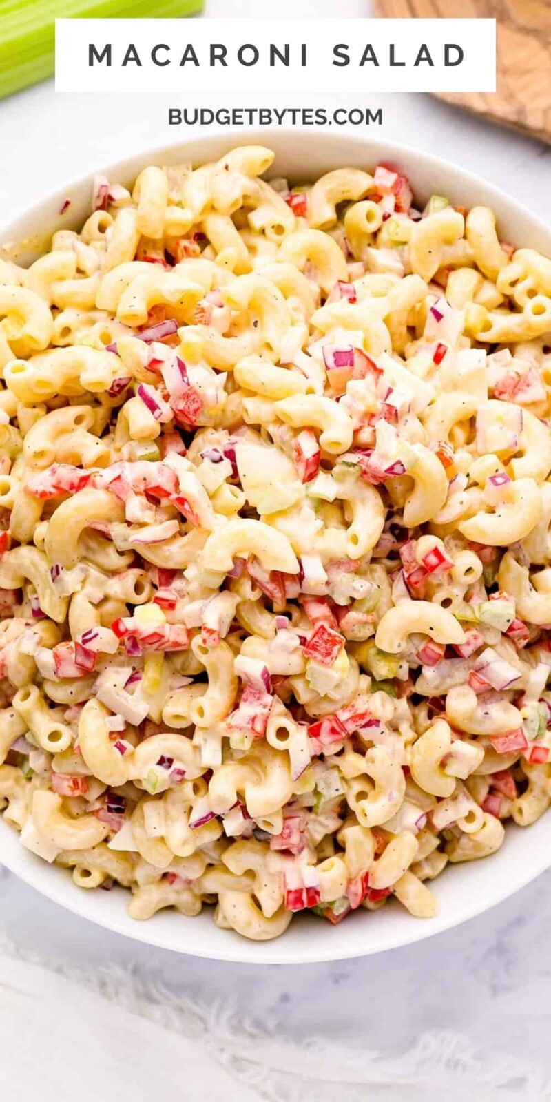 Close up overhead view of macaroni salad in a bowl.