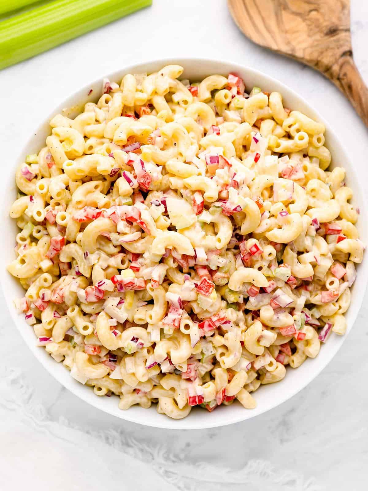 Overhead view of macaroni salad in a bowl.