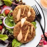 Two tuna cakes drizzled with comeback sauce.