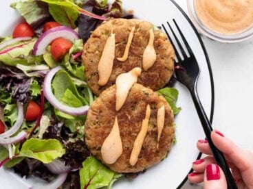 Two tuna cakes drizzled with comeback sauce.