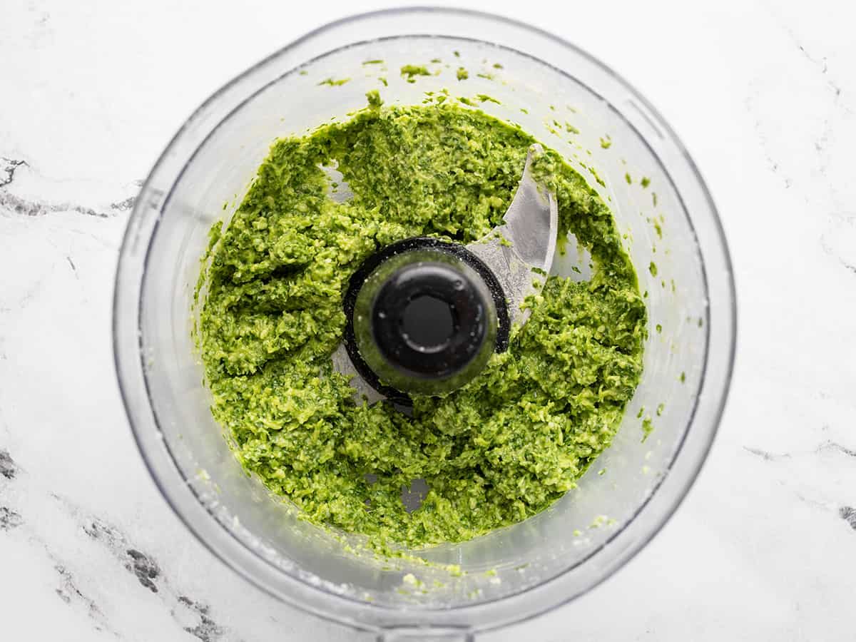 Finished parsley pesto in a food processor.