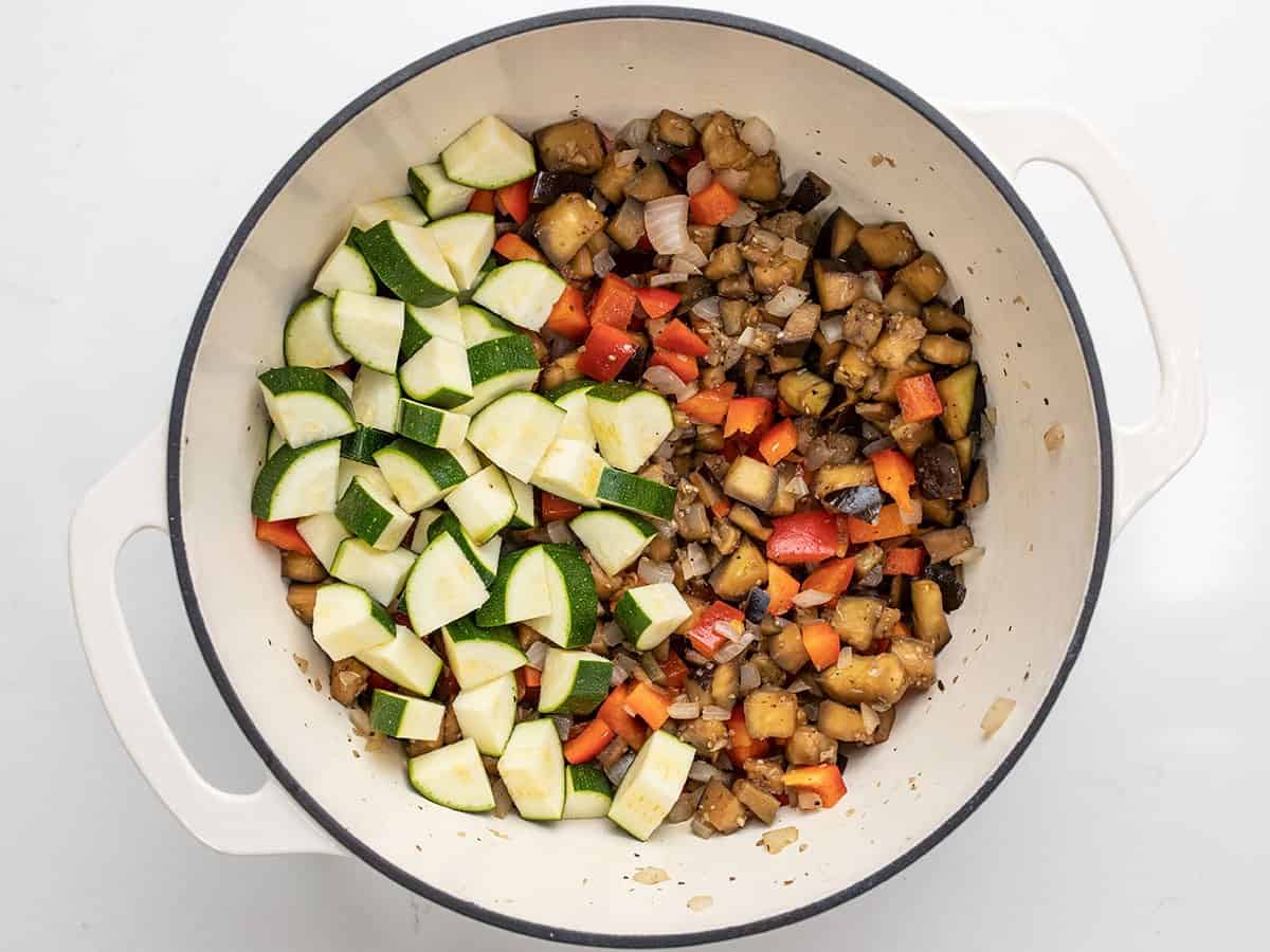 Chopped zucchini added to the pot.