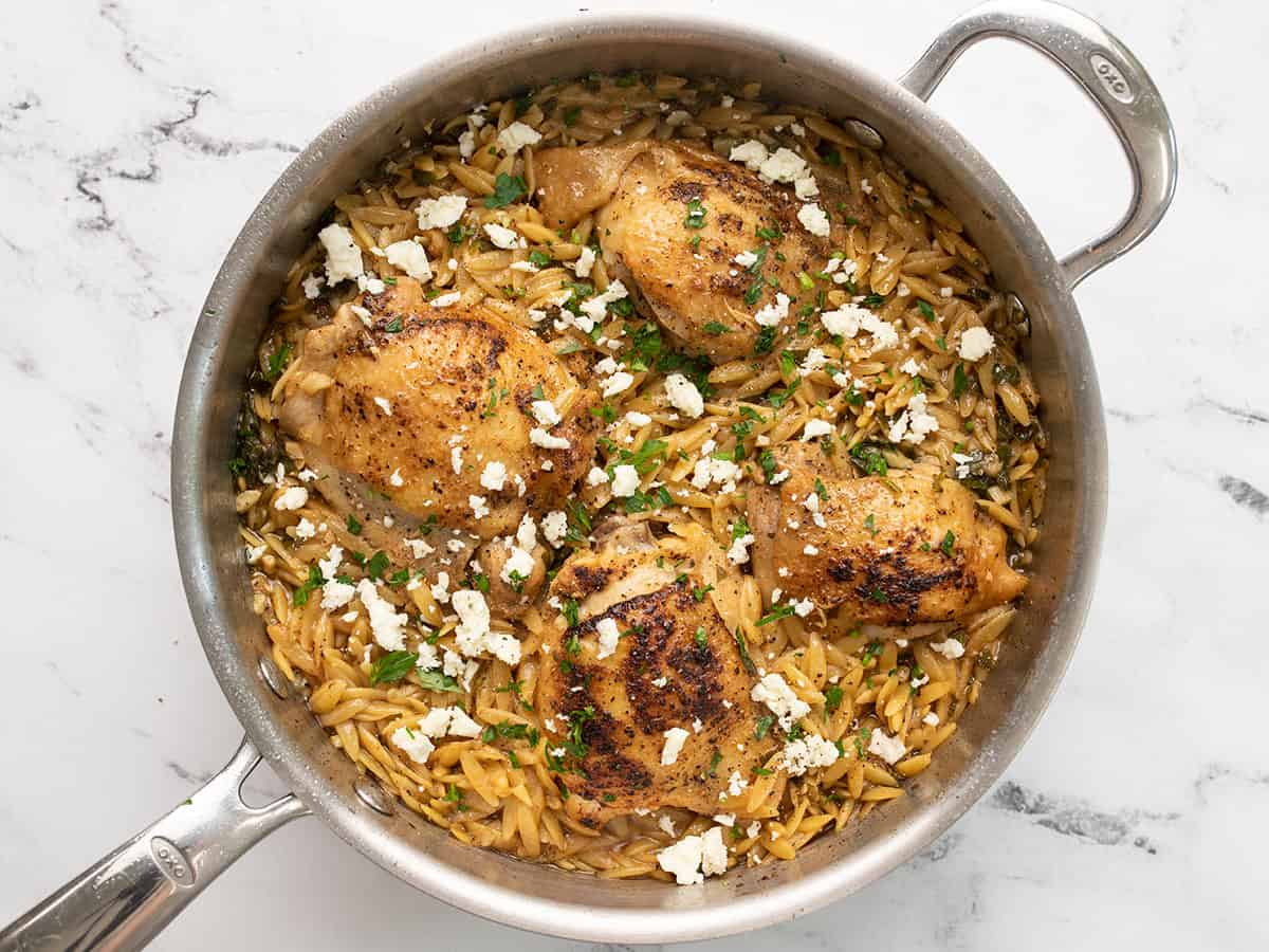 Finished lemon pepper chicken and orzo in the pan.