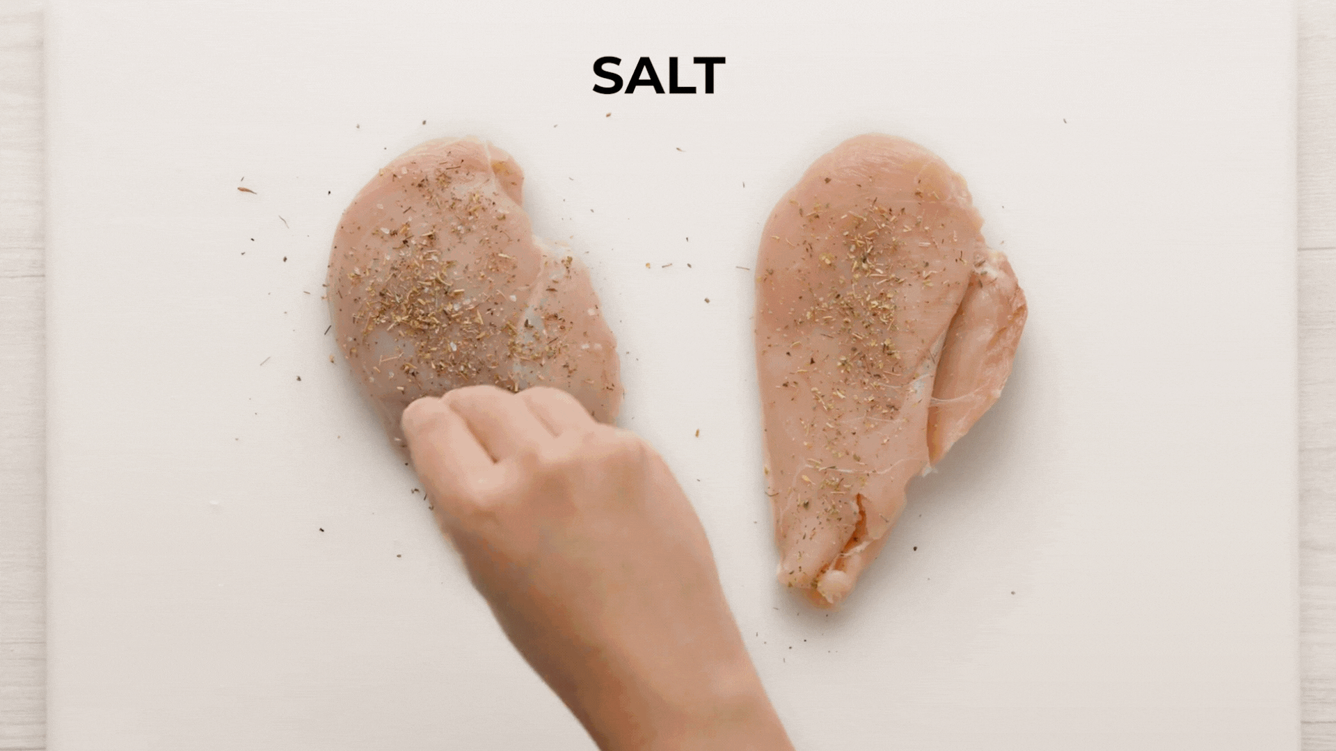 Seared chicken in the skillet.