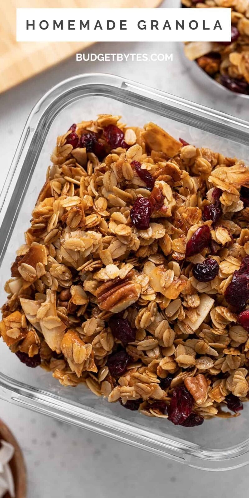 Overhead view of a glass container full of granola.