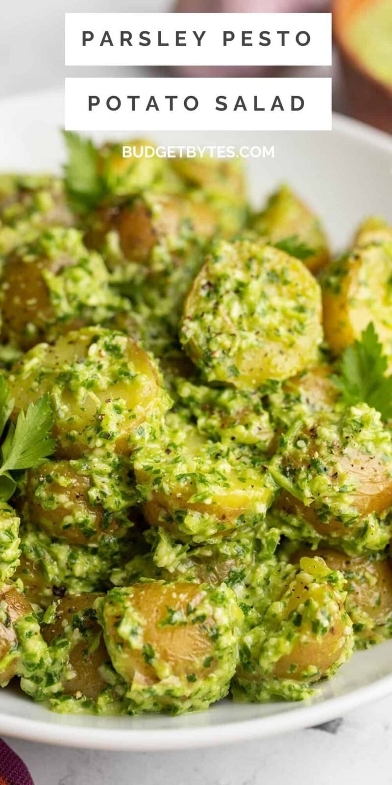 Close up side view of pesto potato salad.